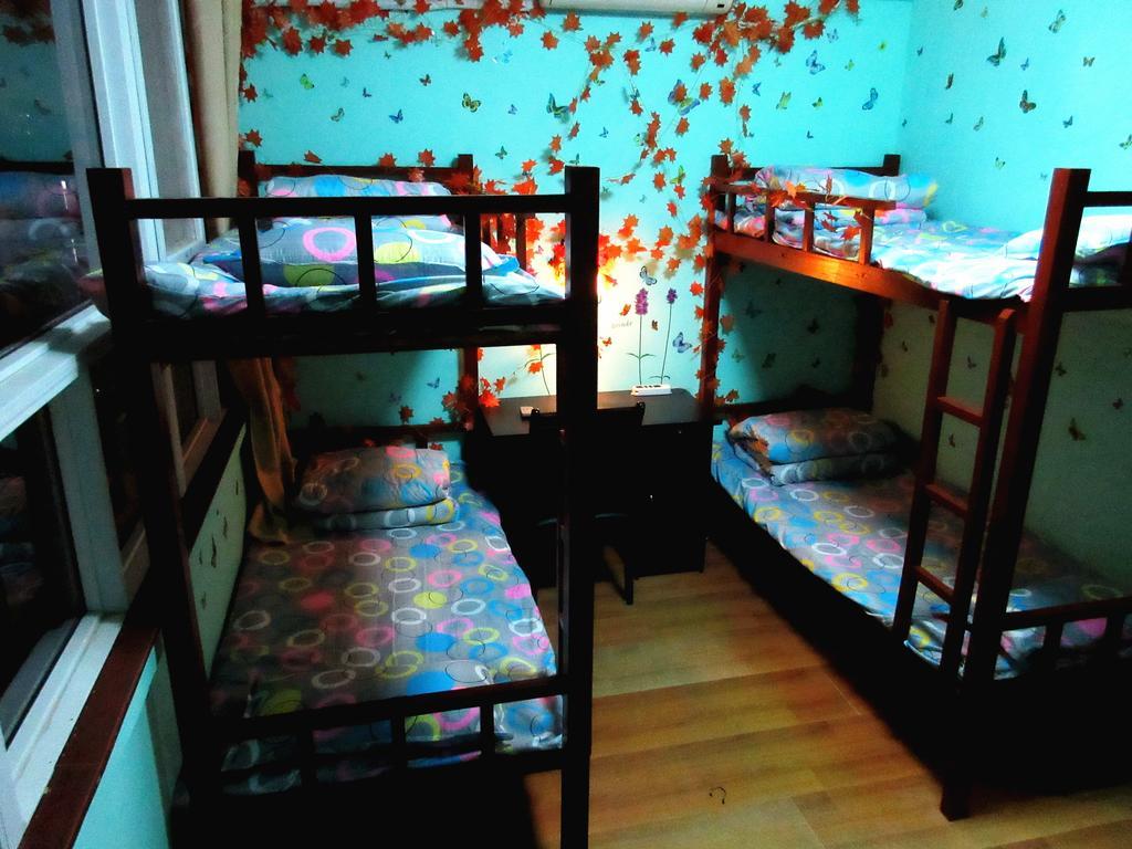 25°C Four Season Youth Hostel Csingtao Szoba fotó